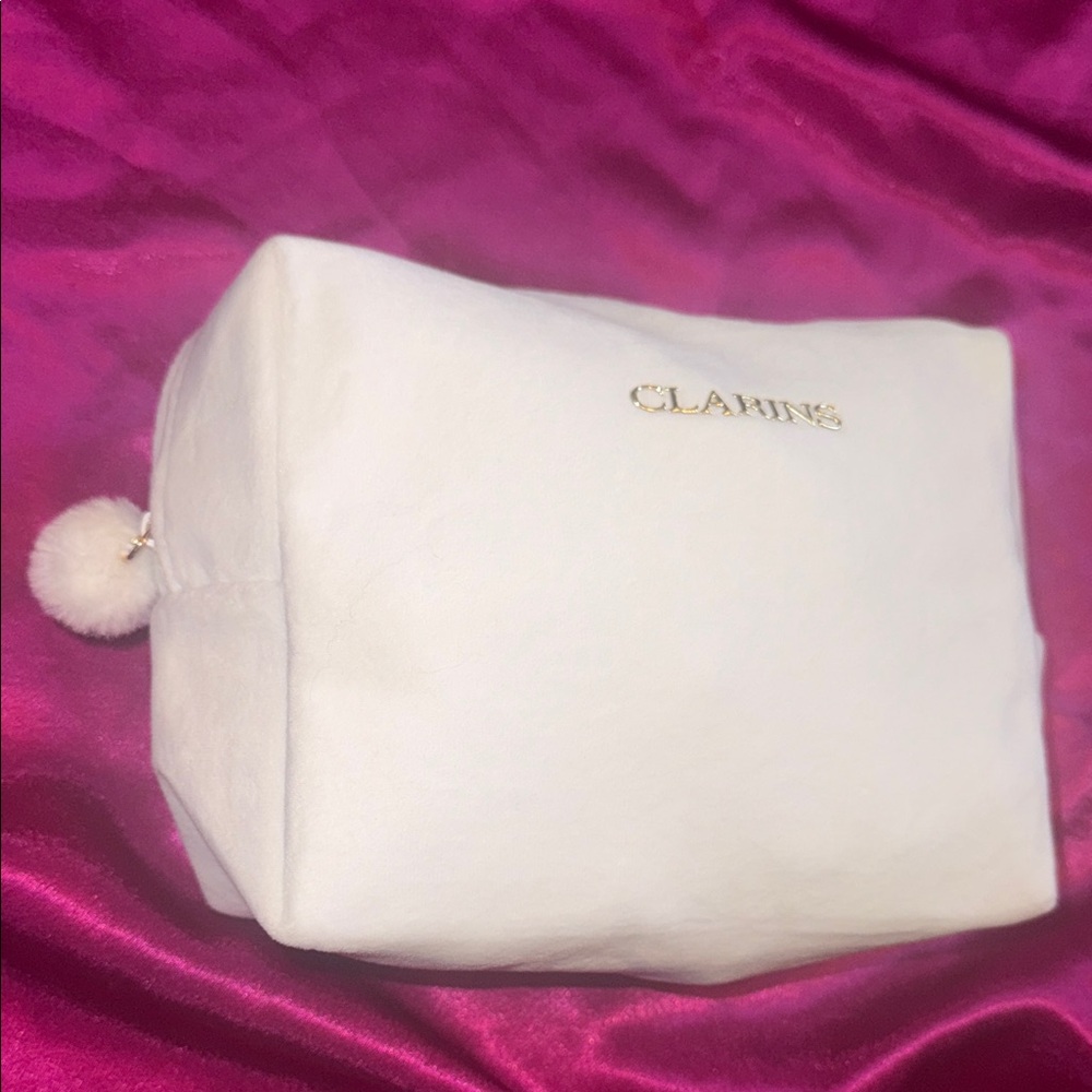 Clarins White Cosmetic Pouch with Pom Pom
